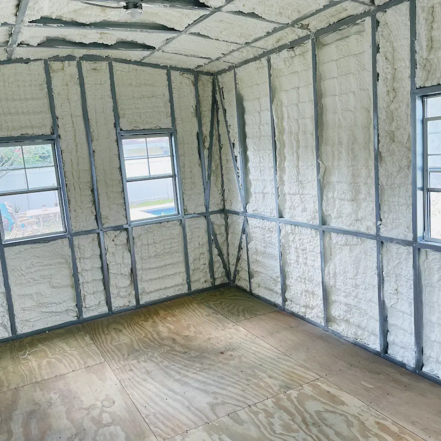 Closed-cell spray foam insulation applied to wall cavities in a residential project in Forest Hill